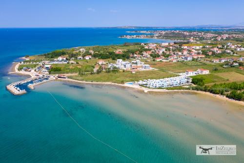 an aerial view of a resort on a beach at Villa Miri in Privlaka
