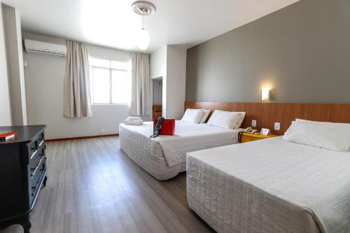 Itajaí Express Residenceにあるベッド
