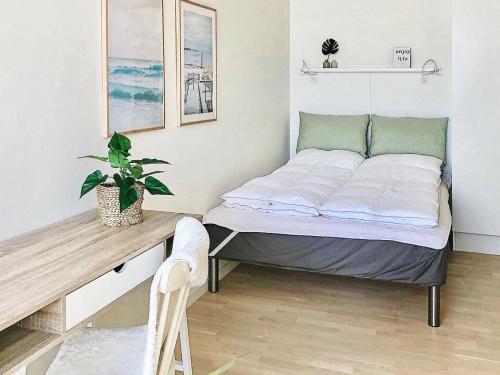 Ένα ή περισσότερα κρεβάτια σε δωμάτιο στο 8 person holiday home in Ringkøbing-By Traum
