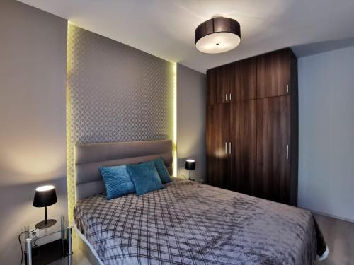 Posteľ alebo postele v izbe v ubytovaní Luna apartment