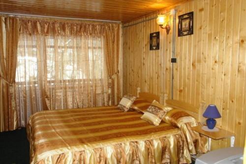 a bedroom with a large bed in a room at Casa Valea Iancului SINAIA in Sinaia