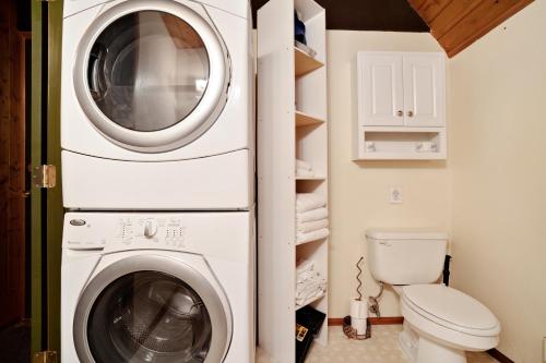 a laundry room with a washer and dryer at Cedarwood Grove in Baring