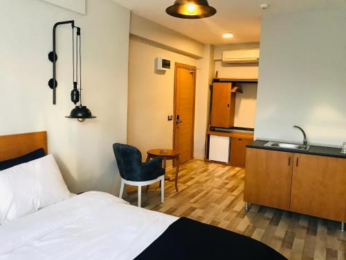 Postel nebo postele na pokoji v ubytování Barkod Otel