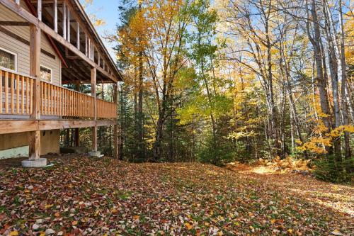 a porch of a house with leaves on the ground at Lily's Pad in Greenville