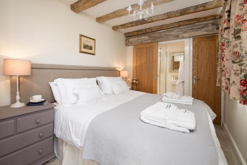 Postel nebo postele na pokoji v ubytování Hayloft Cottage