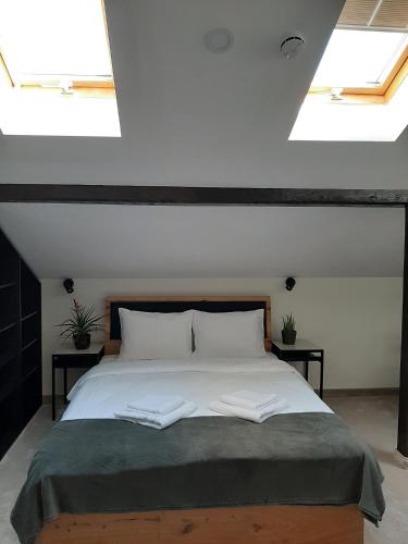 Кровать или кровати в номере Urban Lodge Belgrade