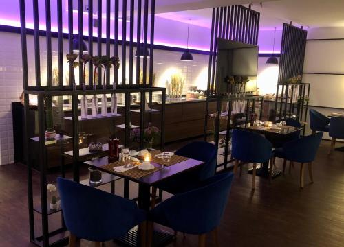 ホテル ラモー ガルニにあるレストランまたは飲食店