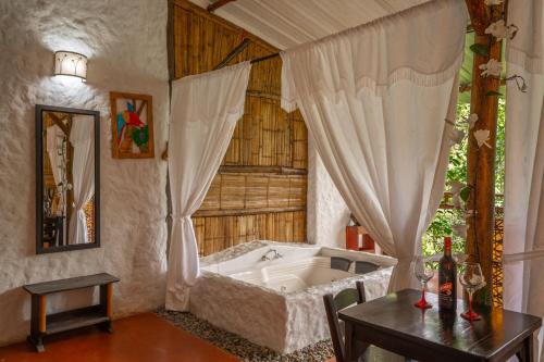 A bed or beds in a room at Posada Turistica Dantayaco