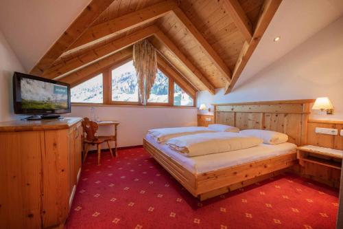 Postel nebo postele na pokoji v ubytování Sportpension Elisabeth