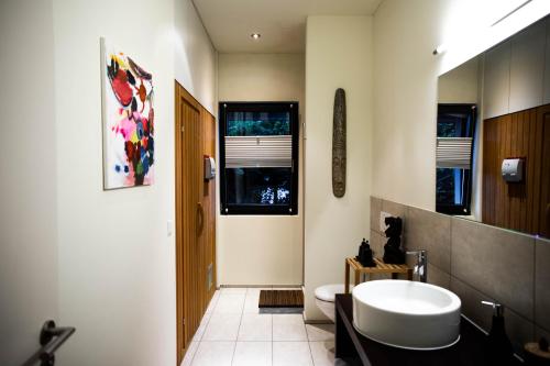 A bathroom at Luxury loft on top of Villa Wilen with tremendous views by the lake