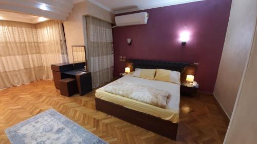 Ліжко або ліжка в номері Villa Nasr city
