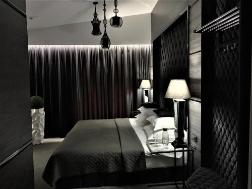 Кровать или кровати в номере Hotel Fado