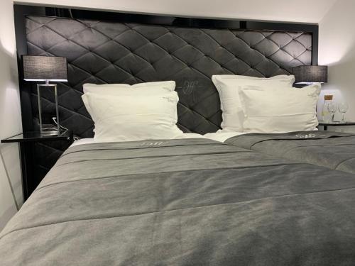 Кровать или кровати в номере Hotel Fado
