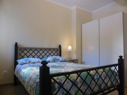 a bedroom with a bed and a dresser at A View to the River Tejo by SixtyFive Boutique Home in Lisbon