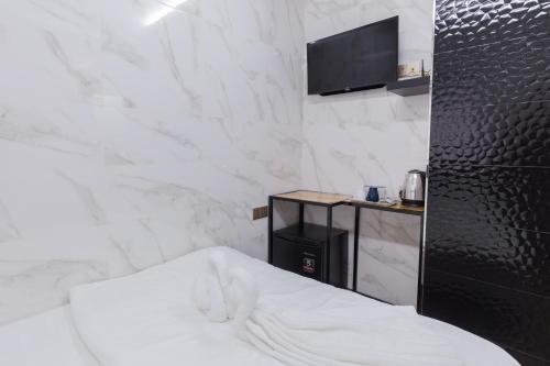Letto o letti in una camera di Lee Luxury Home USM Penang
