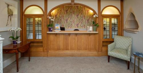 The lobby or reception area at Lords Of The Manor 