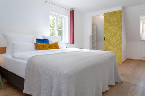 
Ein Bett oder Betten in einem Zimmer der Unterkunft hezelhof hotel
