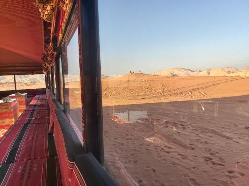 a view of the desert from a train window at Wadi Rum Desert Adventures in Wadi Rum
