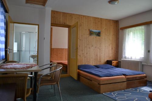 Postel nebo postele na pokoji v ubytování Hostel Fortuna