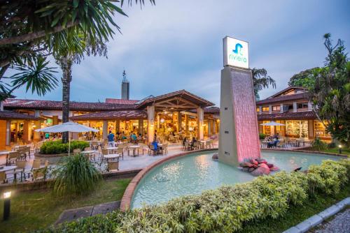 Πισίνα στο ή κοντά στο Ap Riviera uma quadra da praia