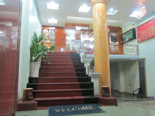 a stairway in a building with a lobby at Dong Duong Hotel in Hai Phong