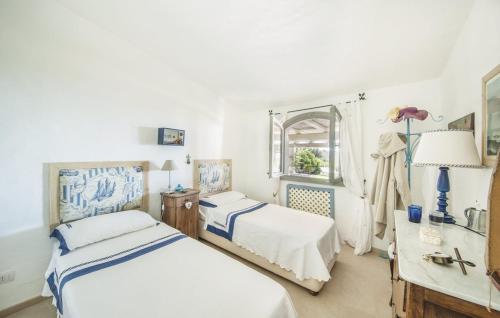 Ένα ή περισσότερα κρεβάτια σε δωμάτιο στο Villa La Nicchia