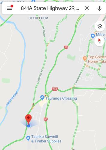 a screenshot of a google map with a red dot at The Edge Tauriko in Tauranga