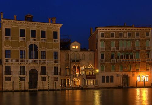 
a large building with a clock on top of it at Al Ponte Antico in Venice
