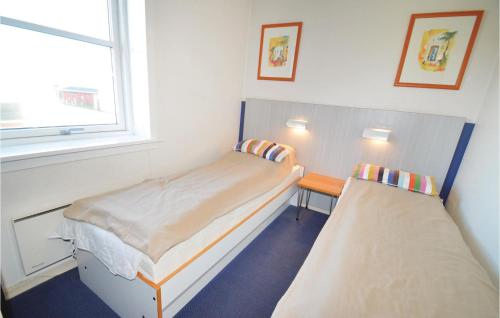 Postel nebo postele na pokoji v ubytování Cozy Apartment In Borre With Wifi