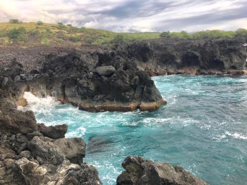 a view of the ocean from a cliff at Da Kona West 305 in Kailua-Kona