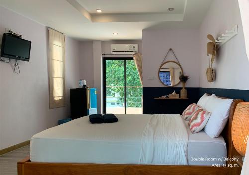 Letto o letti in una camera di Stay Samed Hostel