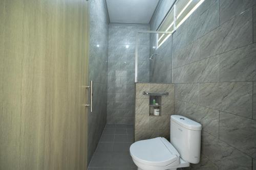 Kylpyhuone majoituspaikassa Bendesa Accommodation