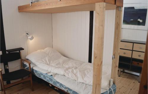 a room with a bed and a desk and a chair at Holiday Home Jacobslystvej Gilleleje Xi in Gilleleje