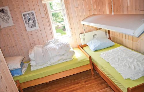 Кровать или кровати в номере 3 Bedroom Awesome Home In Vggerlse