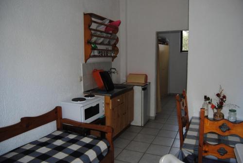 Kuchyň nebo kuchyňský kout v ubytování Sailors Apartments