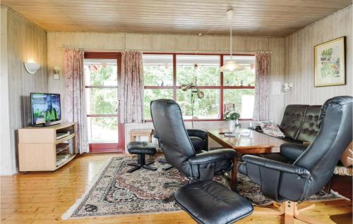 Μια τηλεόραση ή/και κέντρο ψυχαγωγίας στο Holiday Home Hellesvej Løgstør Xi