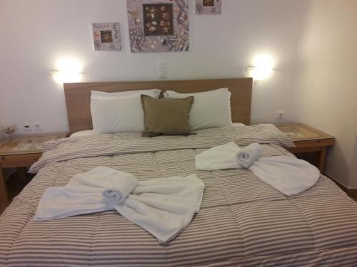Katil atau katil-katil dalam bilik di Heliotropio Studios & Apartments