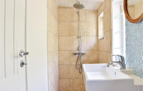 a bathroom with a shower and a sink at Three-Bedroom Holiday Home In Ulfborg in Fjand Gårde