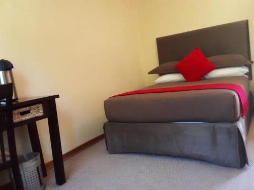 Postel nebo postele na pokoji v ubytování Maluti Stay Lodge