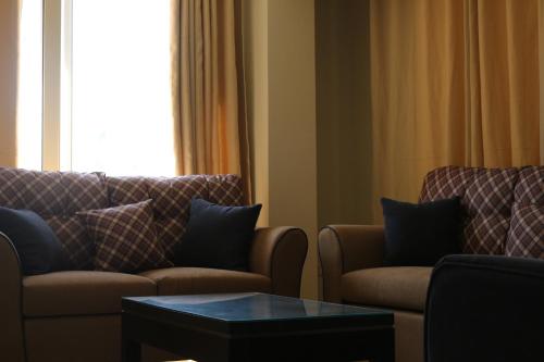 Al Raya Apartmentsにあるシーティングエリア