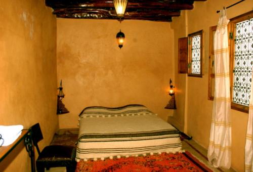 Postel nebo postele na pokoji v ubytování Riad Jade Mogador
