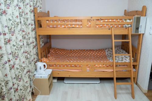 Cocone house Ohoriparkにあるベッド