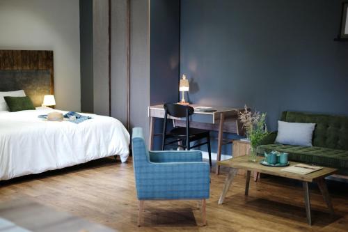 Ένα ή περισσότερα κρεβάτια σε δωμάτιο στο Kaia Residence Danang Quiet Garden