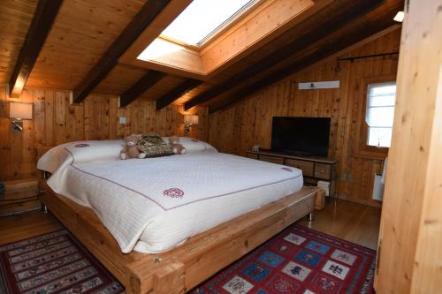 Postel nebo postele na pokoji v ubytování Chalet Mon Rêve