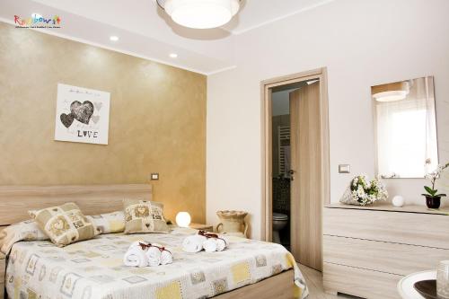 Ένα ή περισσότερα κρεβάτια σε δωμάτιο στο b&b l'olimpo