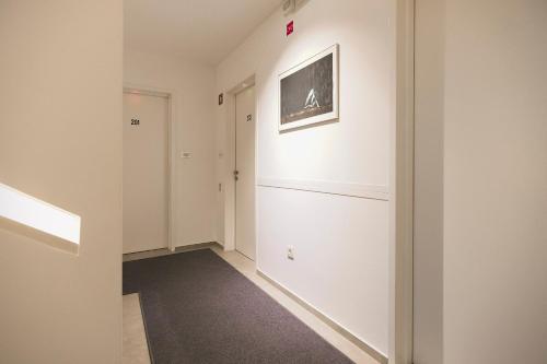 TV a/nebo společenská místnost v ubytování Art Hotel