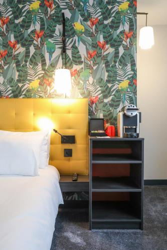 ibis Styles Puteaux Paris La Defenseにあるベッド