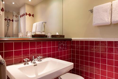 Ванная комната в Hotel Britannique
