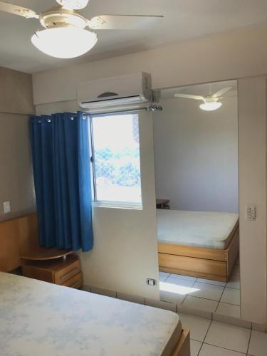 Ένα ή περισσότερα κρεβάτια σε δωμάτιο στο Paradise Flat Residence