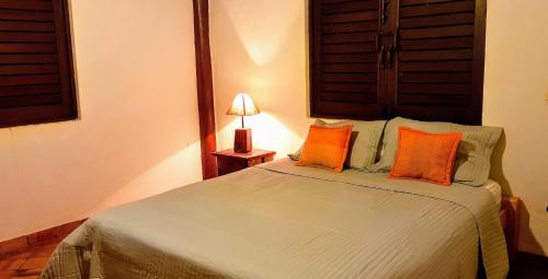 Cama o camas de una habitación en Villa Cannes, Praia do Forte